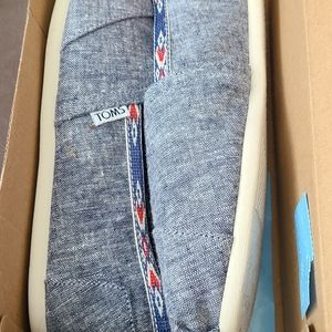 Toms with tribal trim